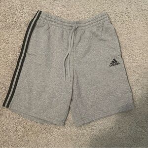 Adidas Gray Athletic Shorts with Three-Stripe Design